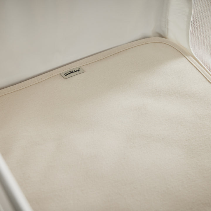 Органічний наматрацник для дитячого ліжечка