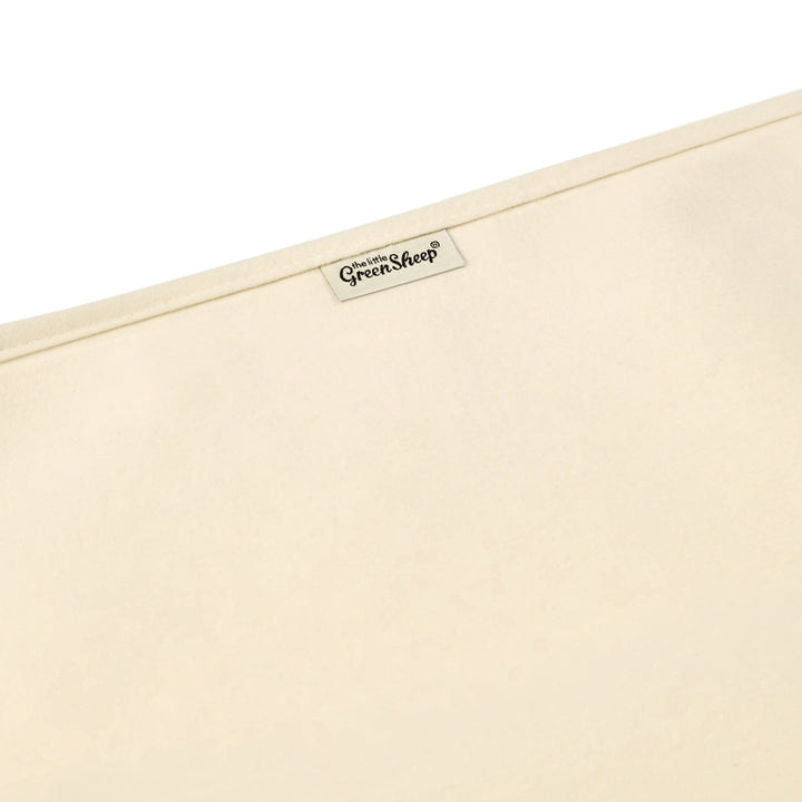 Органічний наматрацник для дитячого ліжечка