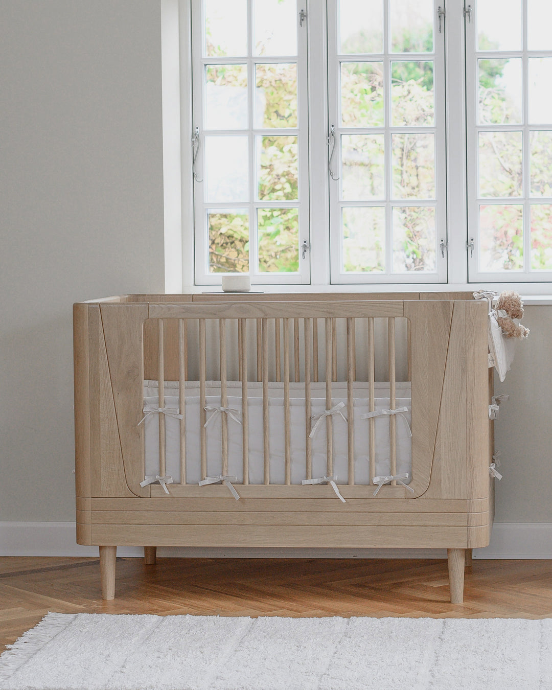 Защитный бортик для кроватки